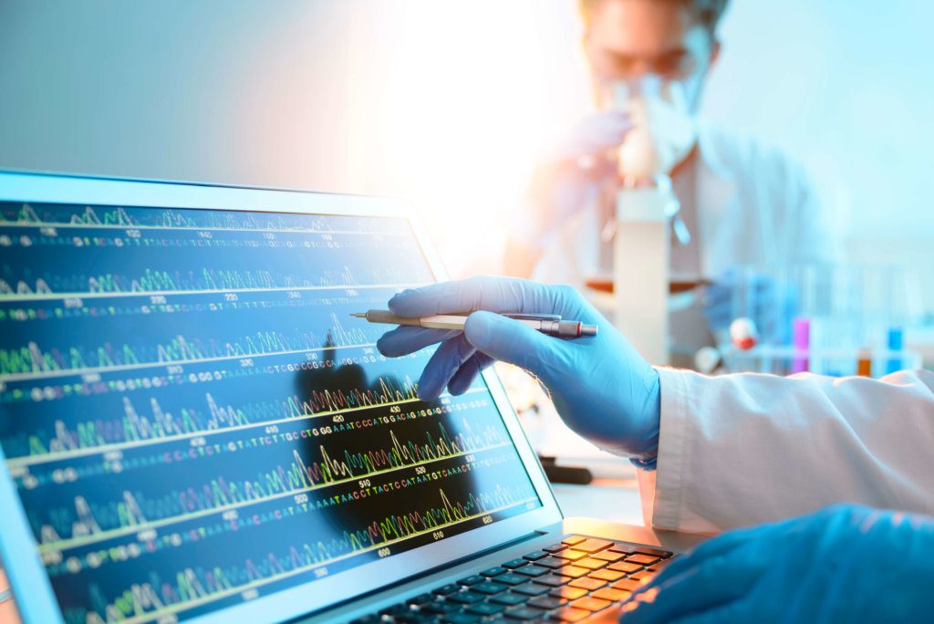 A scientist looking at a DNA sequence